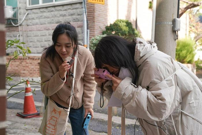 A participant photographing a discovery